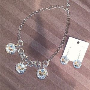Necklace and earrings!! Never worn!